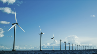Row of wind turbines Rope access inspection KC international Services